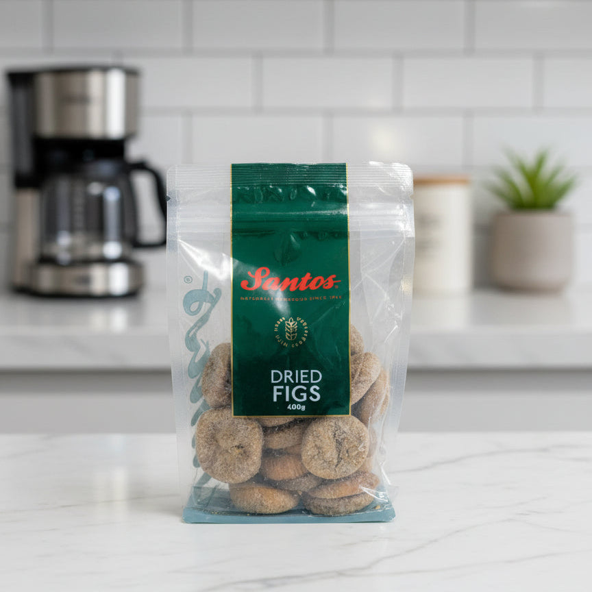 Bag of Santos dried figs on a kitchen counter with a coffee maker in the background.